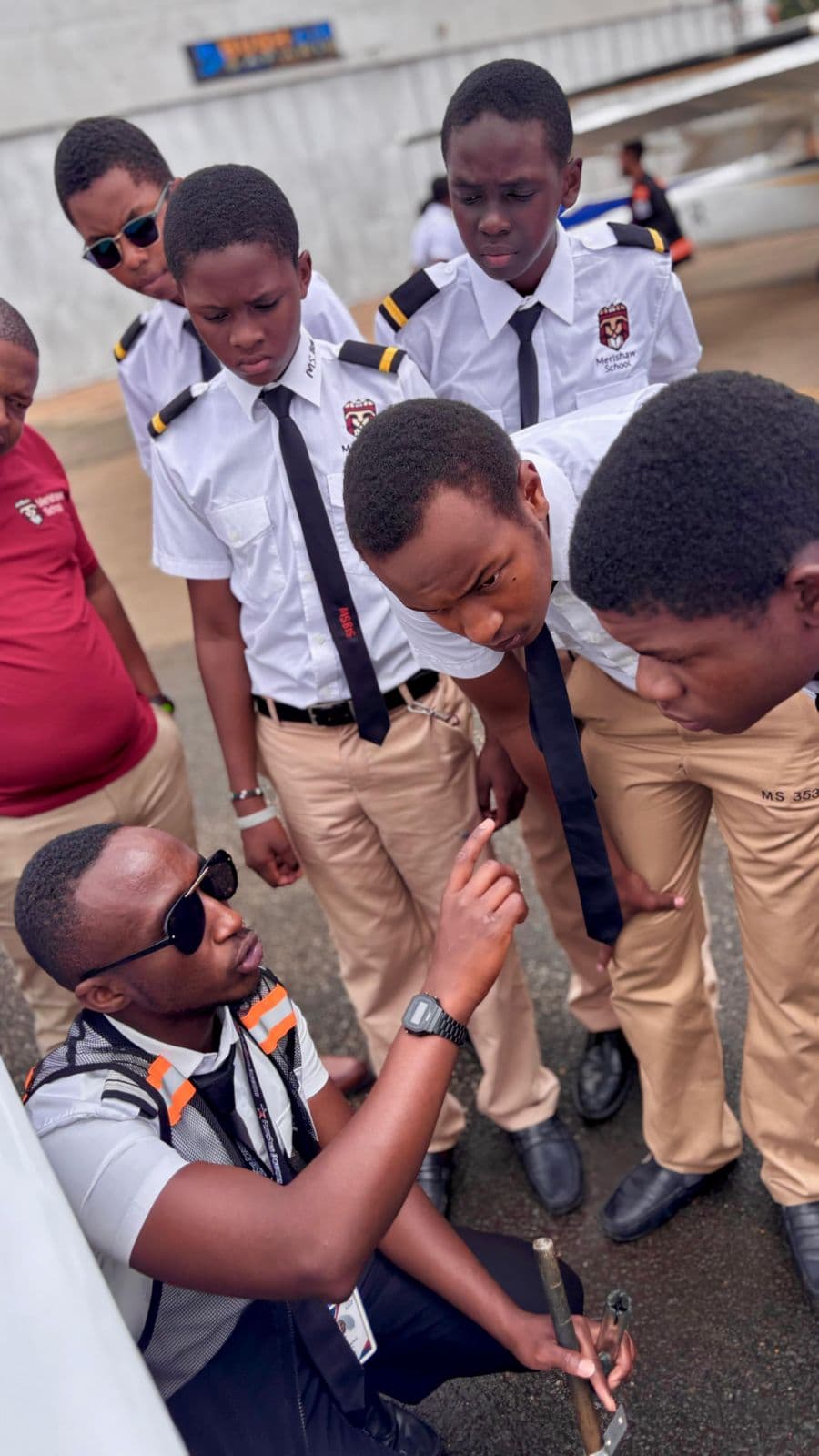Merishaw School aviation students listening to a technical briefing