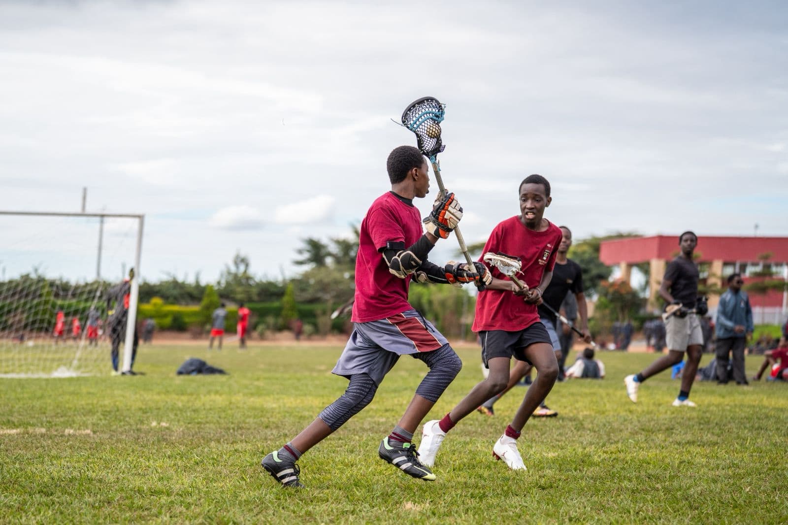 Merishaw School lacrosse students preparing a pass