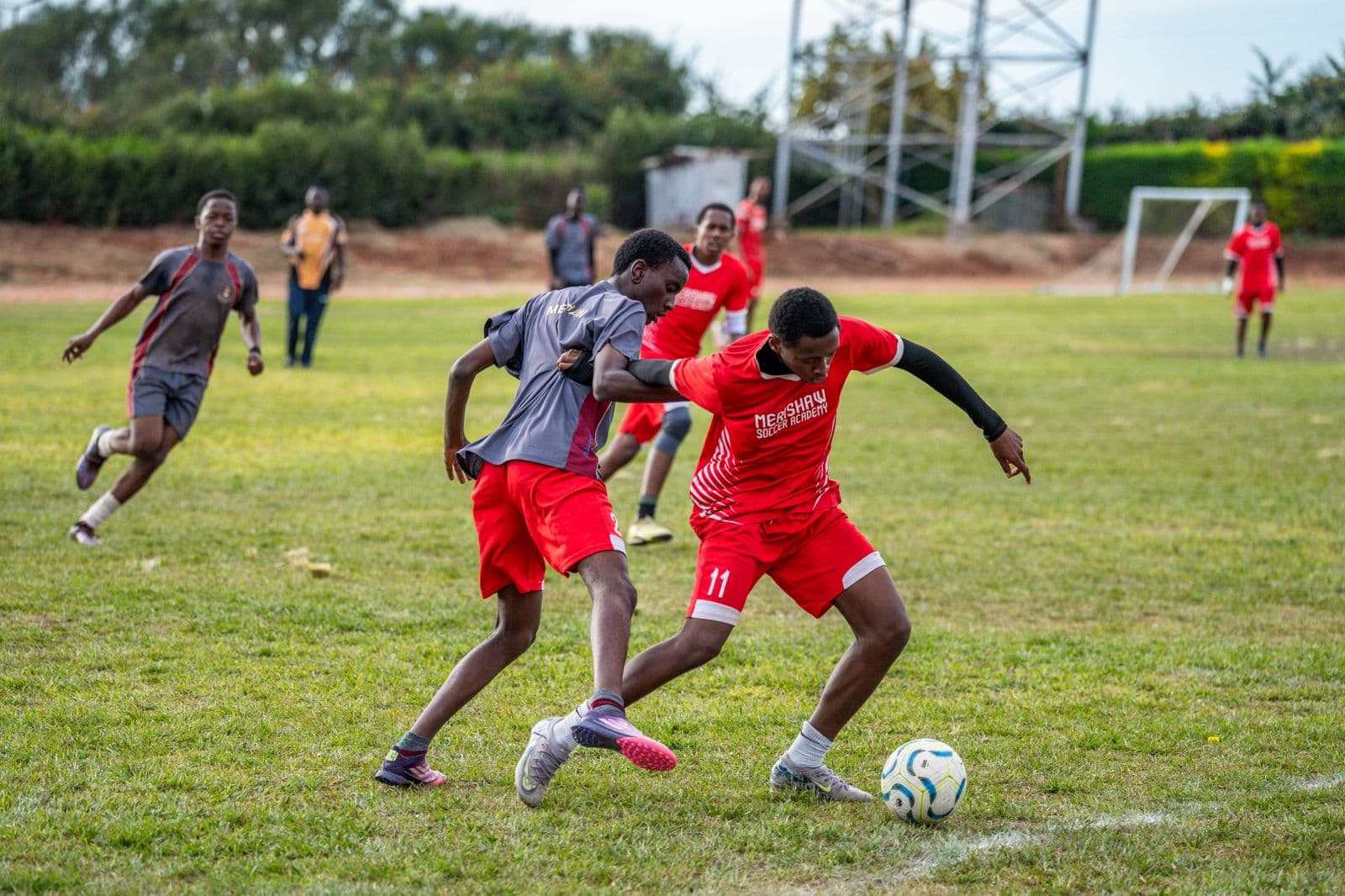 Merishaw Soccer Academy students competing for the ball