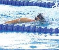 Merishaw School swimmer practising freestyle in a pool lane